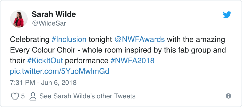 Tweet from Sarah Wilde: Celebrating #Inclusion tonight at the Northwest Football Awards with the amazing Everycolour Choir - whole room inspired by this fab group and their Kick It Out performance!
